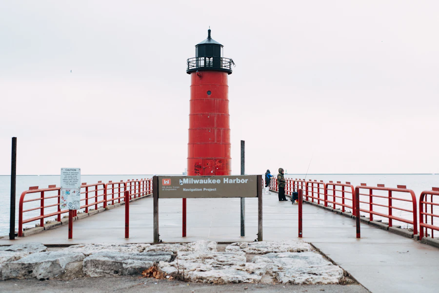 The red Milwaukee pierhead lighthouse at the end of a pier