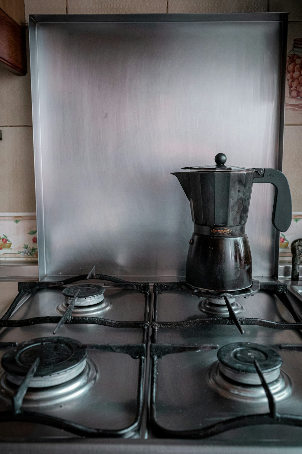 stainless steel kettle on stove