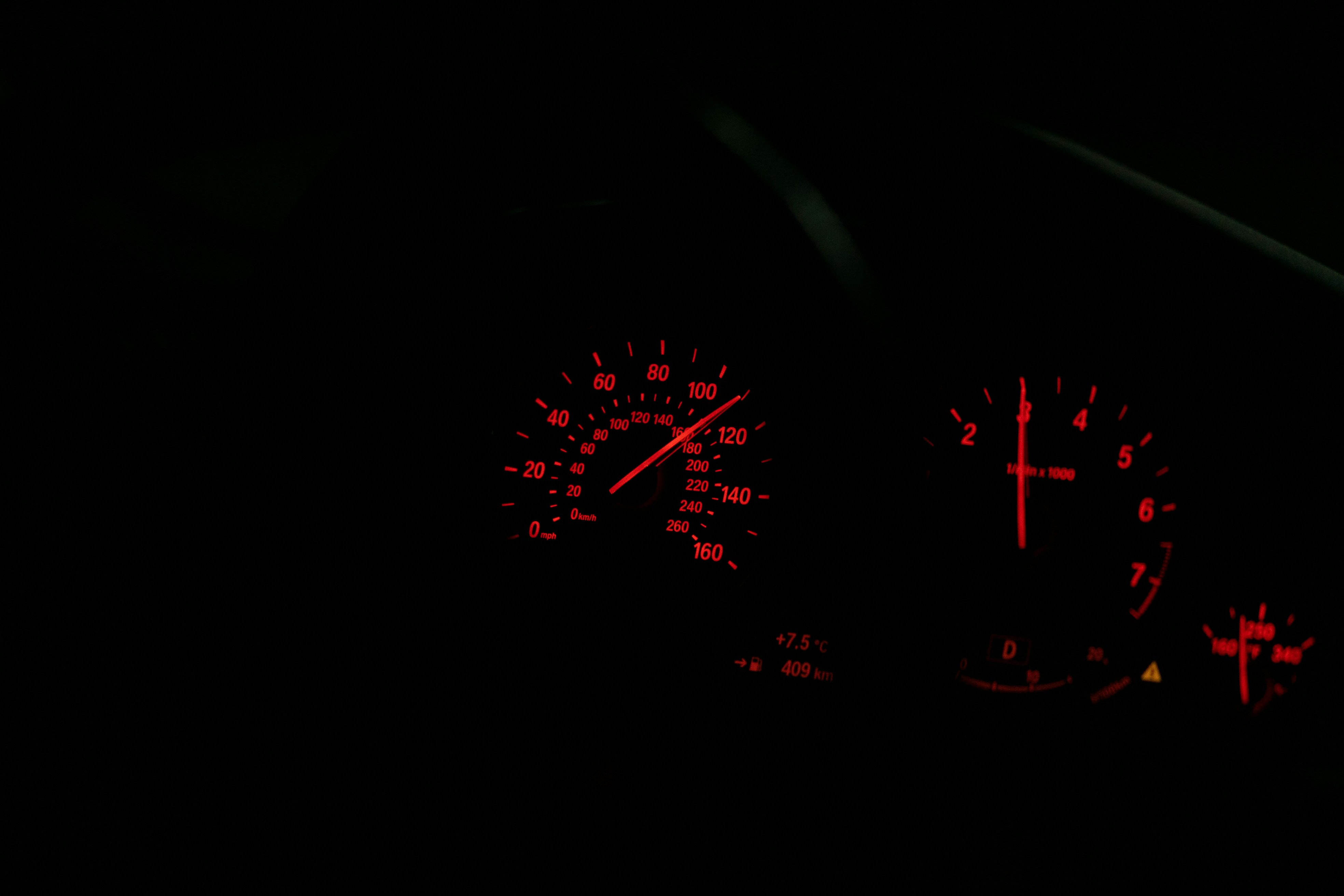 black and red digital speedometer