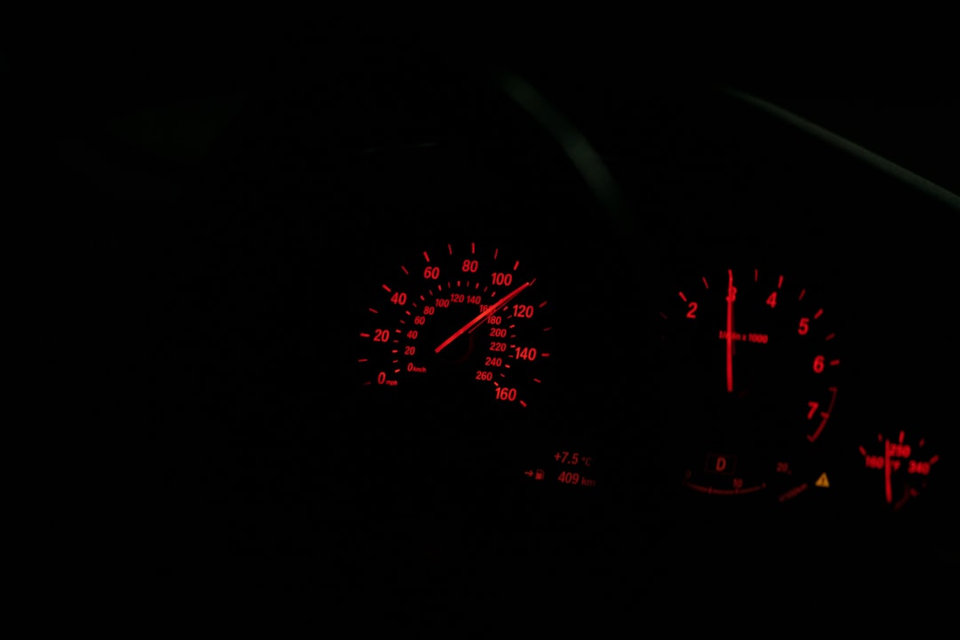 black and red digital speedometer