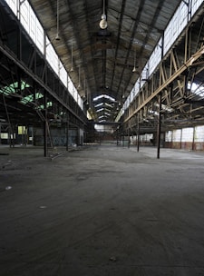 gray concrete building with white metal frame