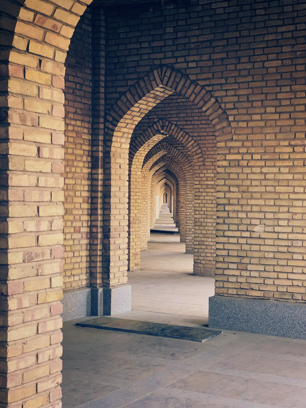 brown brick wall during daytime