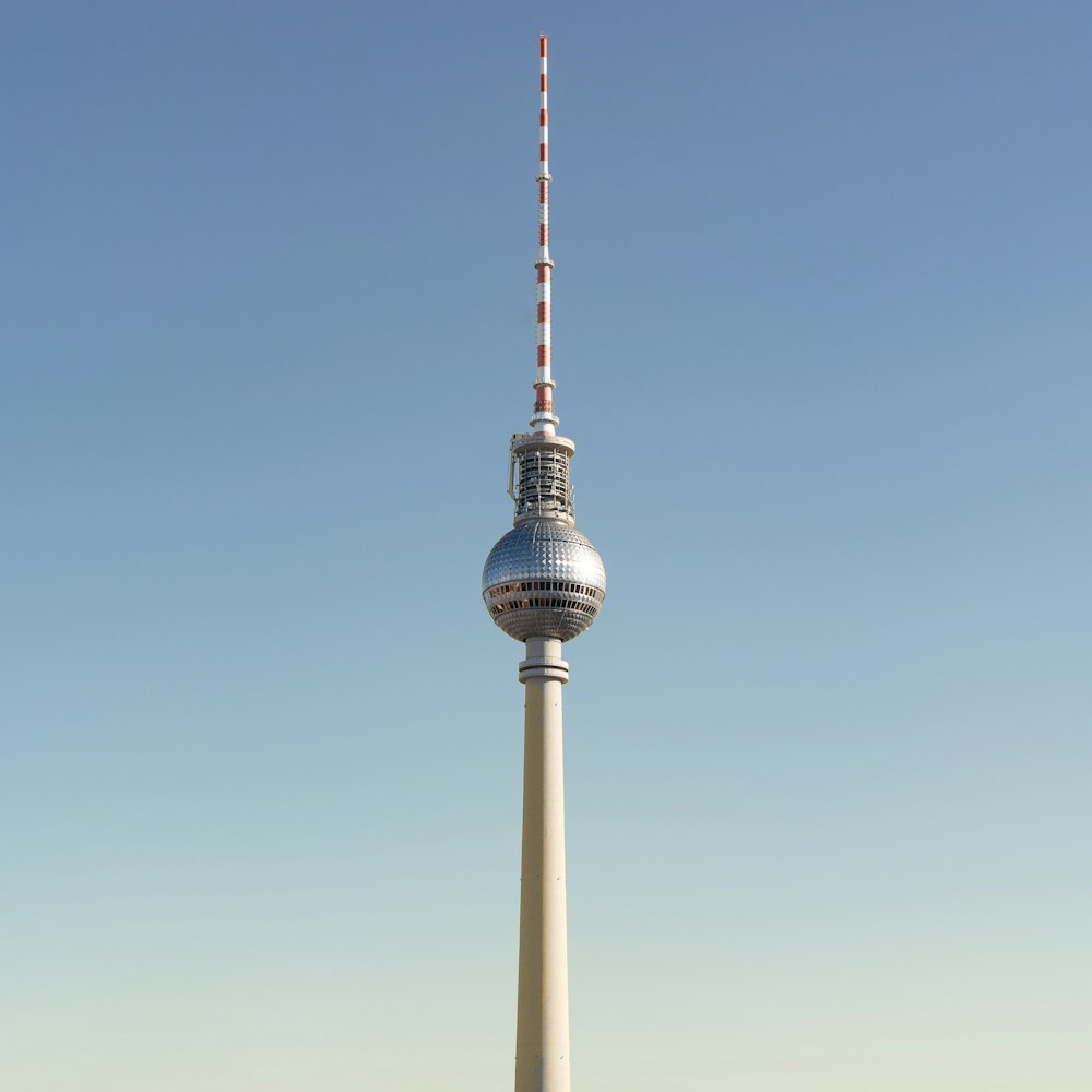 white and black tower under blue sky during daytime