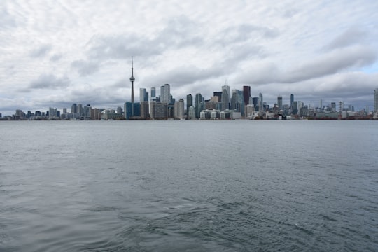 city skyline across body of water during daytime in Roundhouse Park Canada