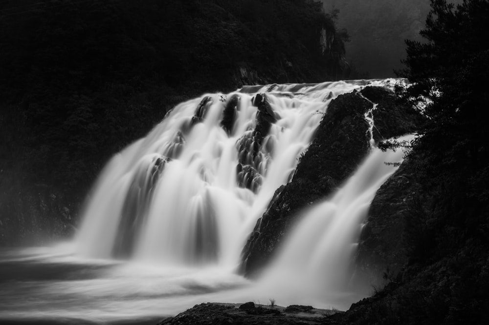 grayscale photo of waterfalls during daytime