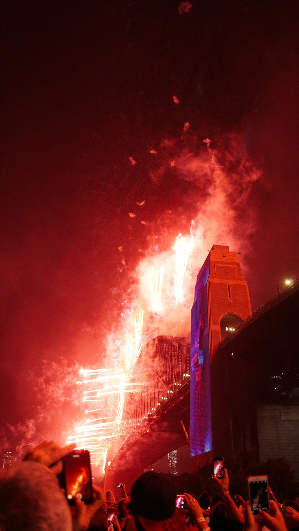 fireworks over high rise building during night time