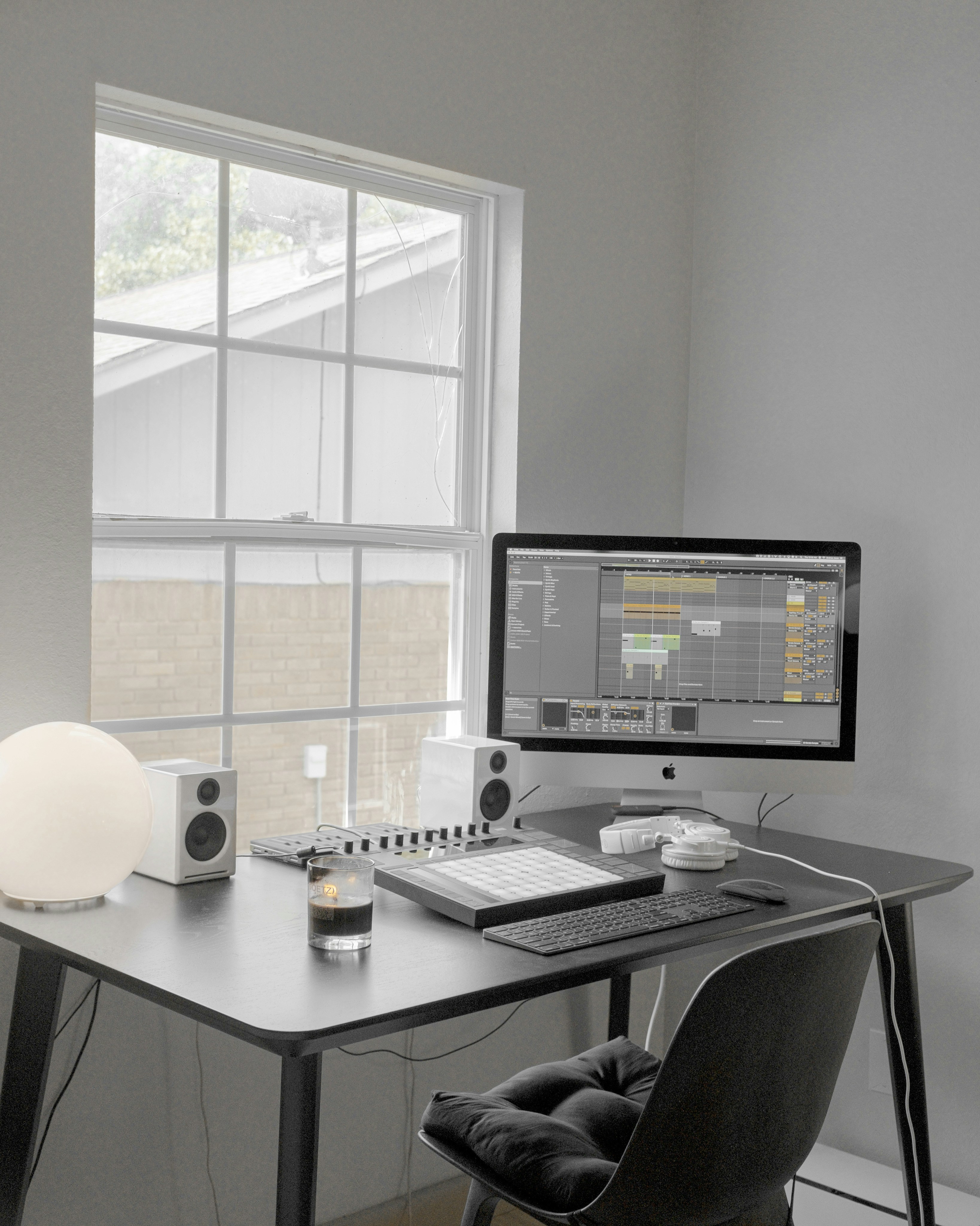 black flat screen computer monitor on white wooden desk