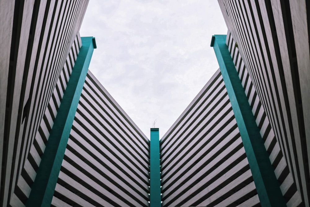 gray concrete building under white clouds during daytime