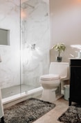 white ceramic toilet bowl beside white ceramic toilet bowl