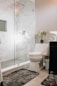 white ceramic toilet bowl beside white ceramic toilet bowl