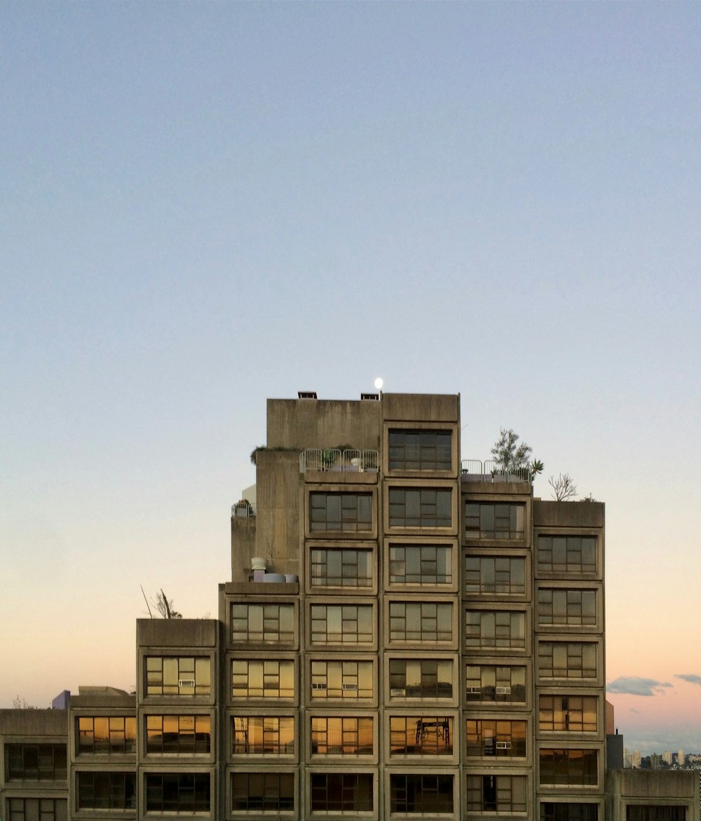 brown concrete building under blue sky during daytime