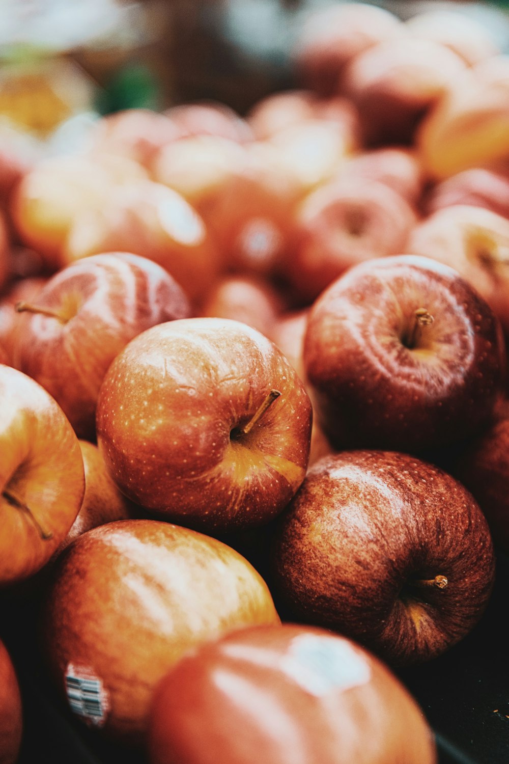 red apples on brown wooden table