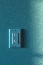 white wall mounted electric socket