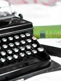 black typewriter on white table