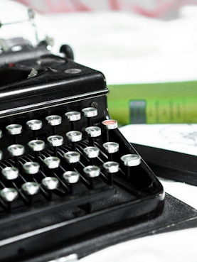 black typewriter on white table