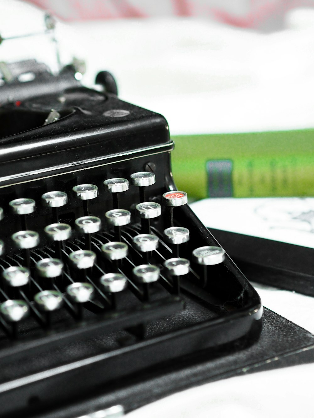 black typewriter on white table