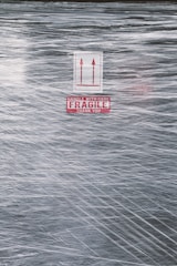 red and white no smoking sign