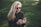 woman in black jacket holding smartphone