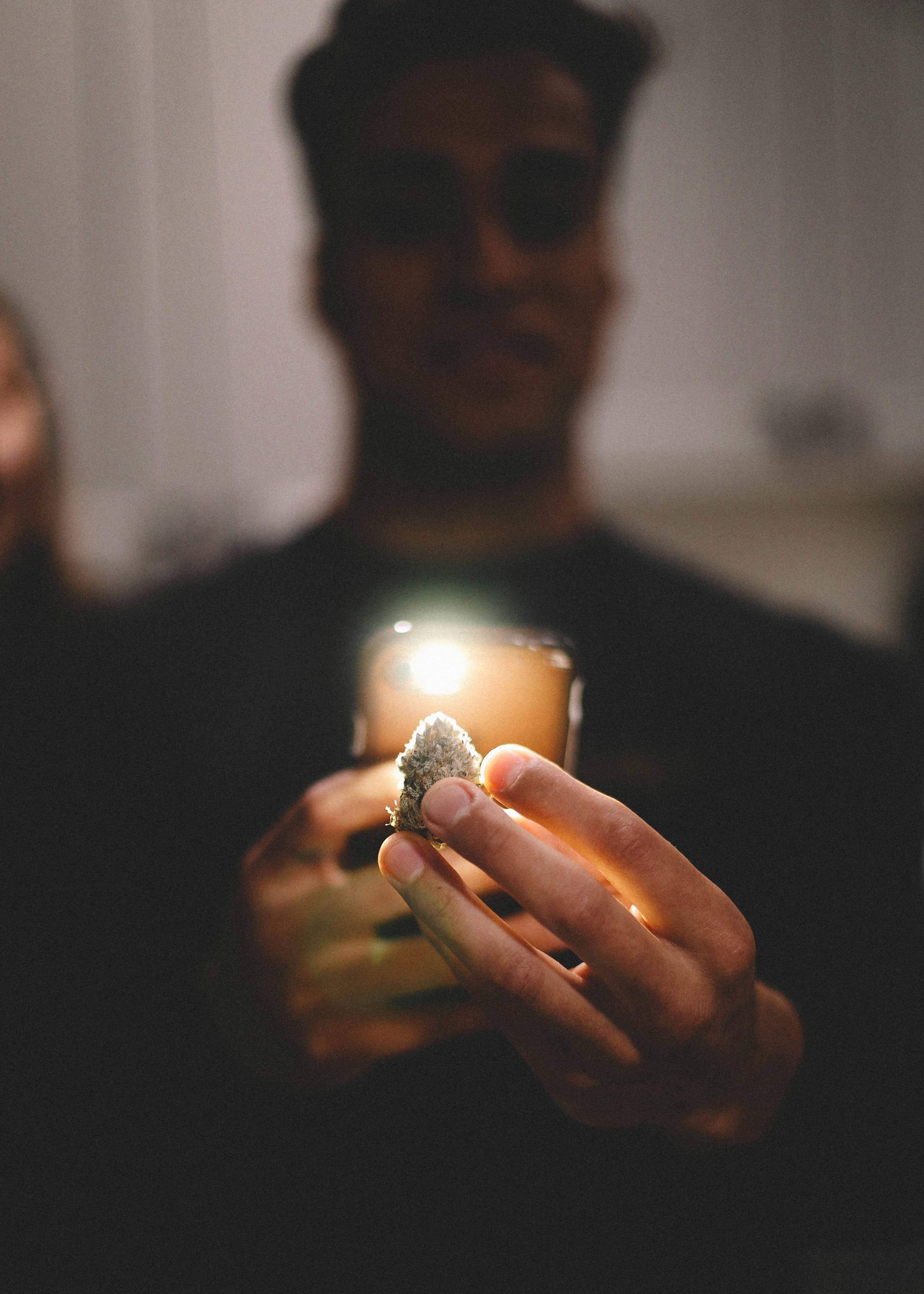 man in black shirt wearing silver ring