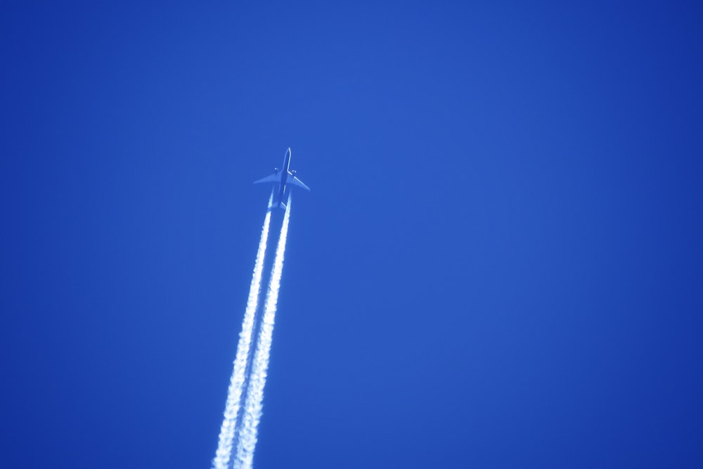 white plane in the sky