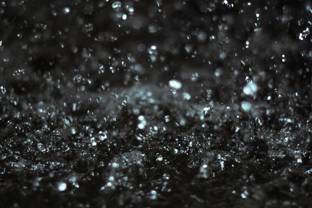 water droplets on black surface