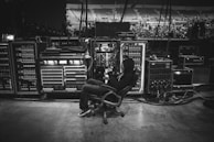 Nina Hepburn setting up her equipment backstage before a show.
