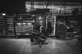 Nina Hepburn setting up her equipment backstage before a show.