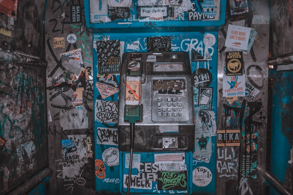 black and gray telephone booth