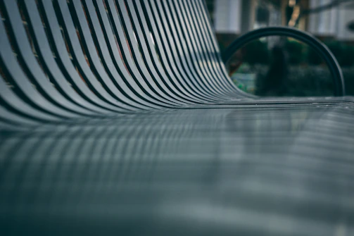 Wide shot of a modern metal bench crafted with sleek lines.