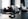 black ip desk phone on black wooden table