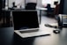 macbook pro on white table