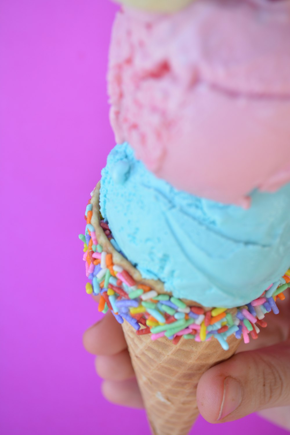 pink blue and yellow ice cream cone