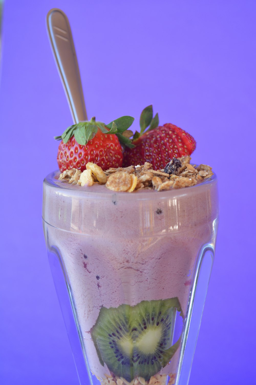 strawberry shake in clear drinking glass