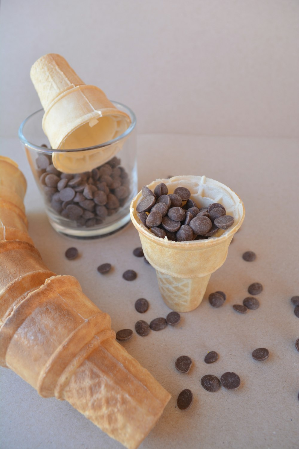 a couple of ice cream cones sitting on top of a table