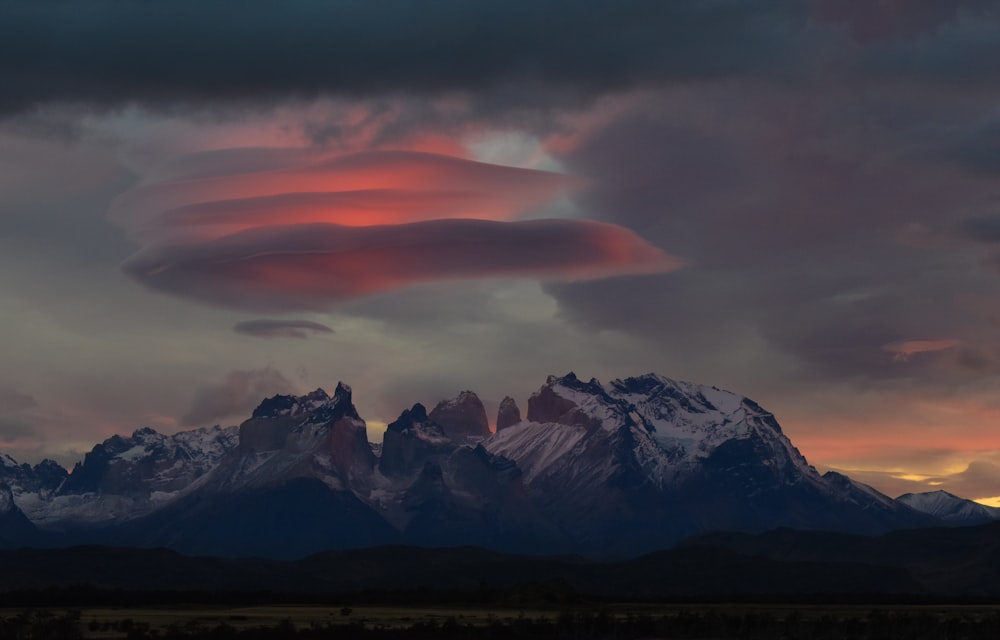 snow covered mountain during daytime