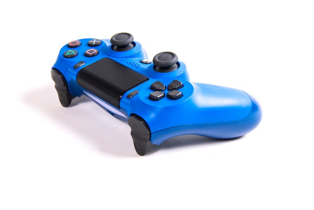 blue and black game controller