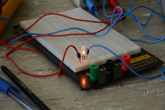 green and orange electric wires