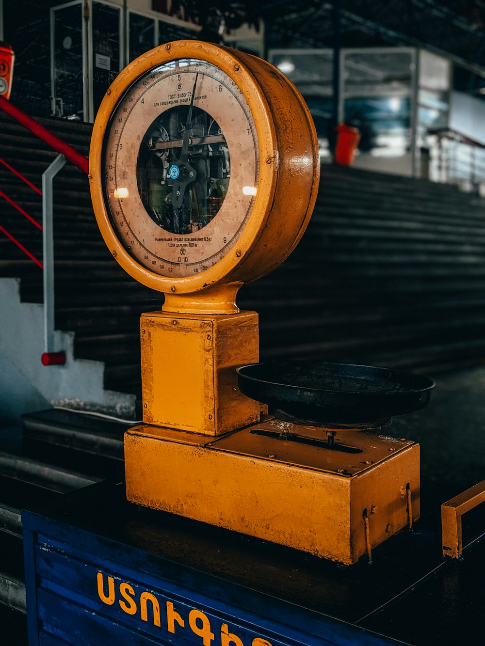 yellow and black weighing scale