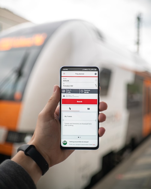 person holding silver iphone 6