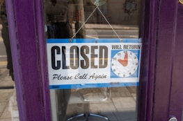 A friendly clock icon indicating the site will be back shortly.