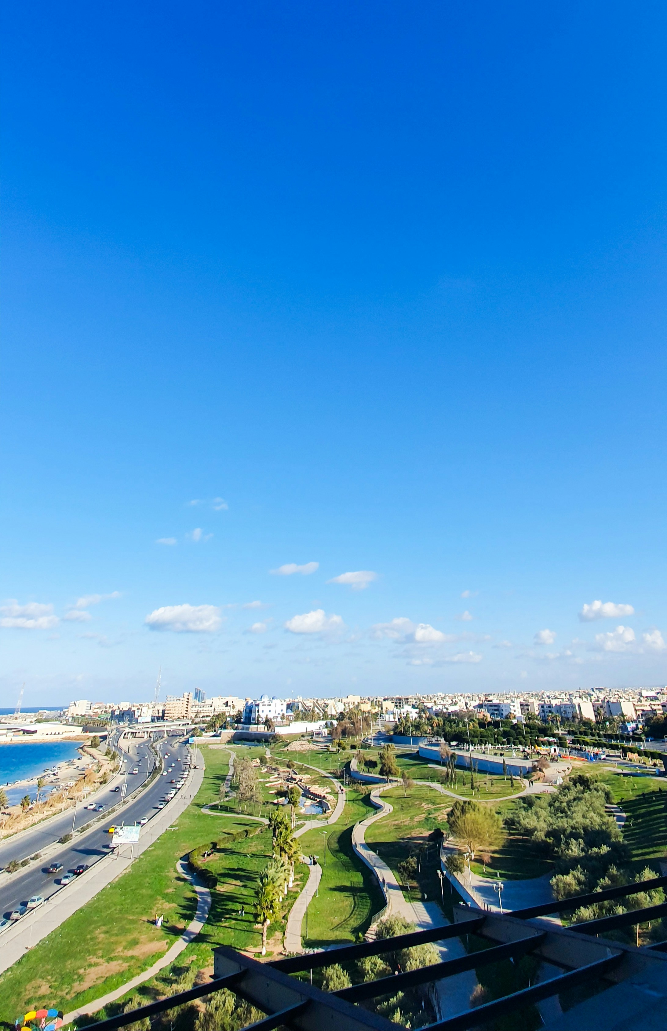 city buildings near body of water during daytime