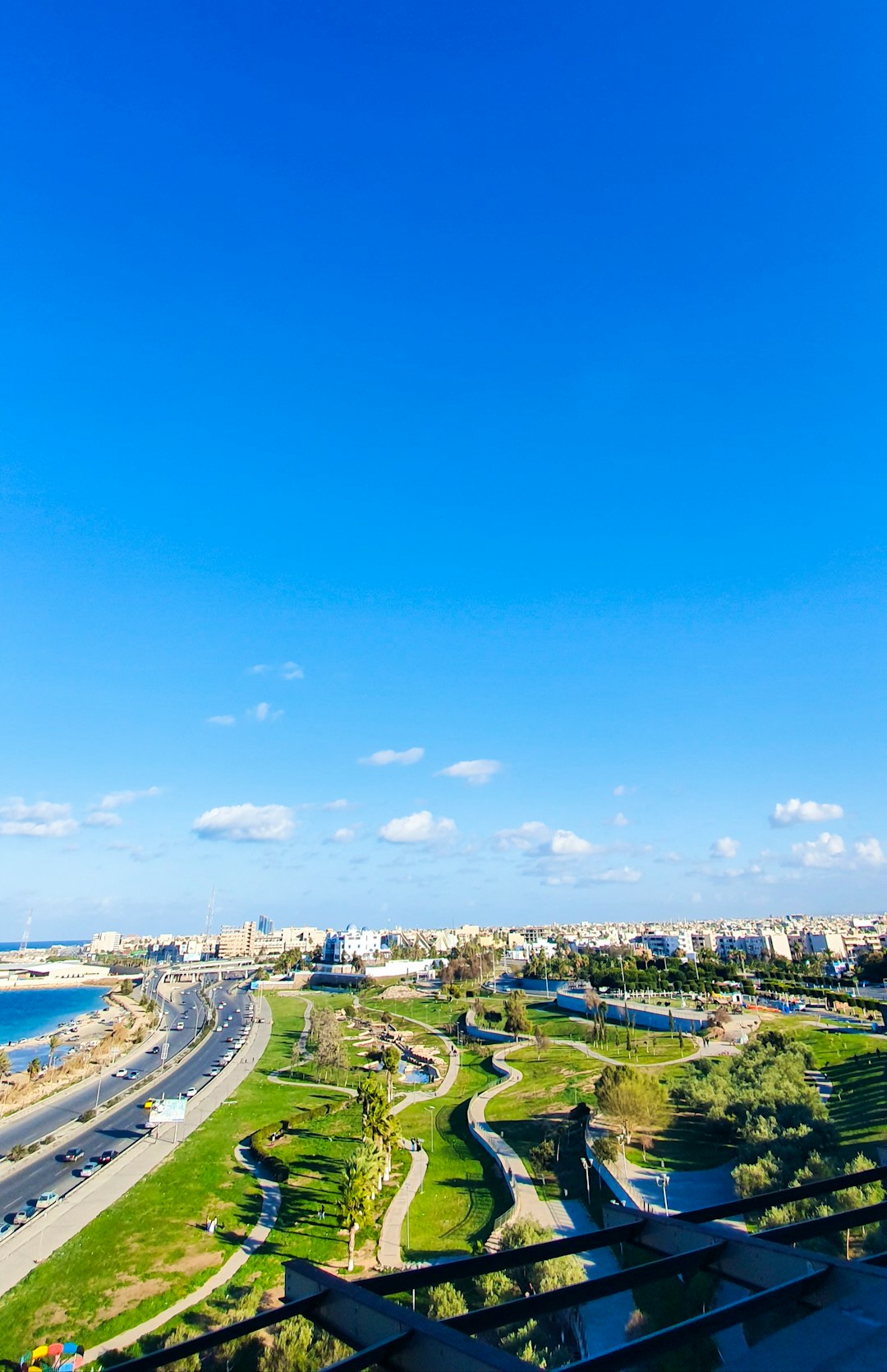 city buildings near body of water during daytime