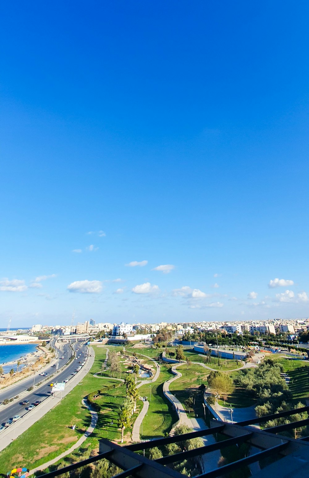 city buildings near body of water during daytime