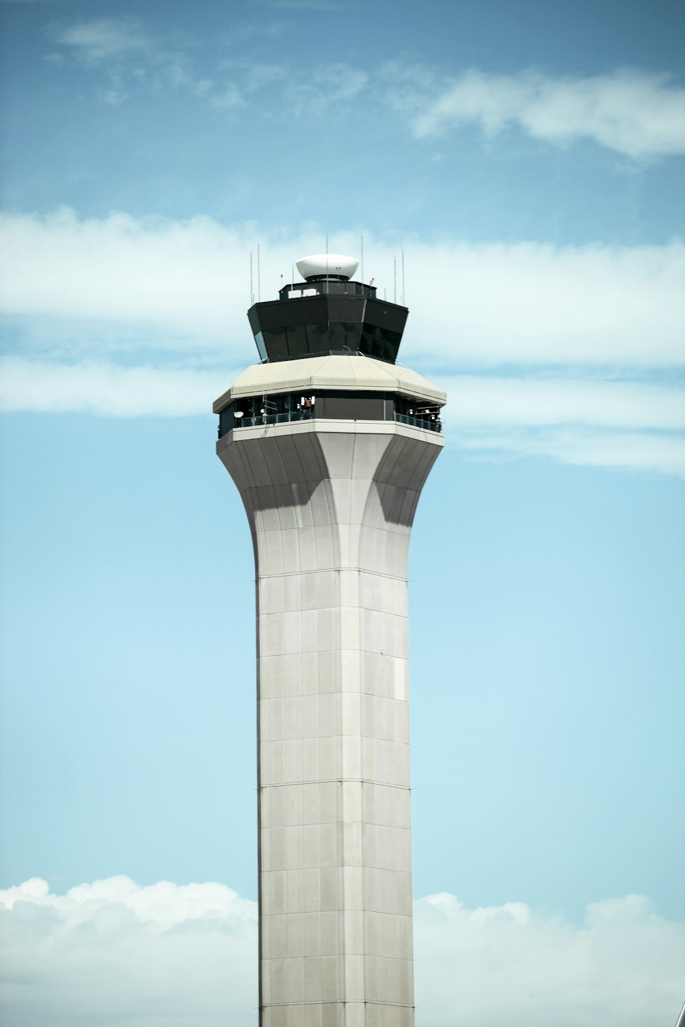 white and brown tower under blue sky during daytime