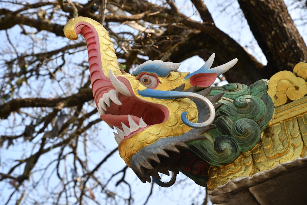 green and red dragon statue