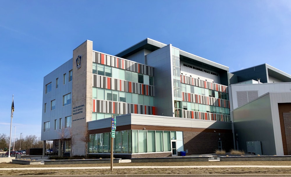 brown and white concrete building under blue sky during daytime