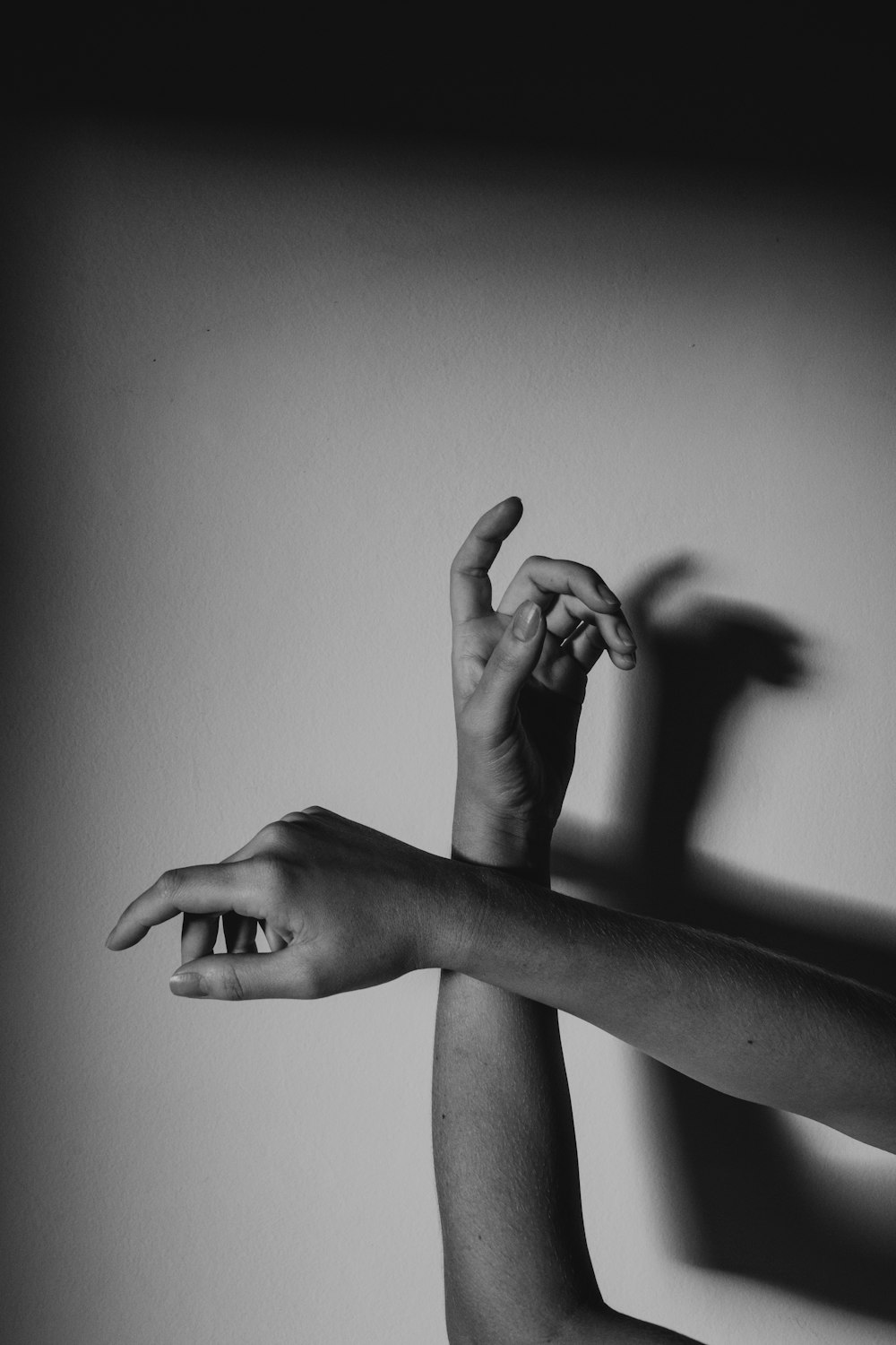 grayscale photo of persons hand