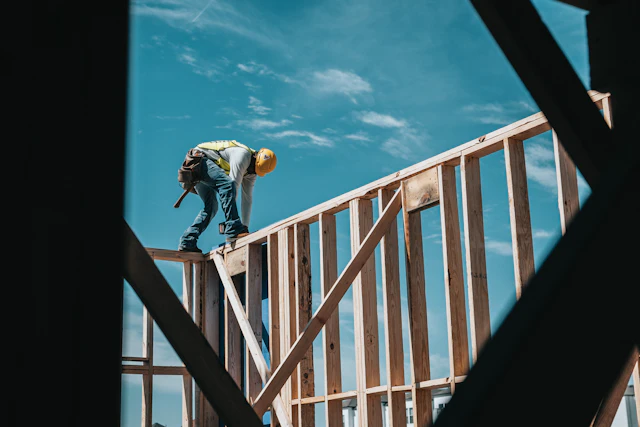 A construction worker in a hard hat on site