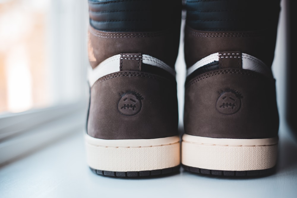 black and brown leather shoes