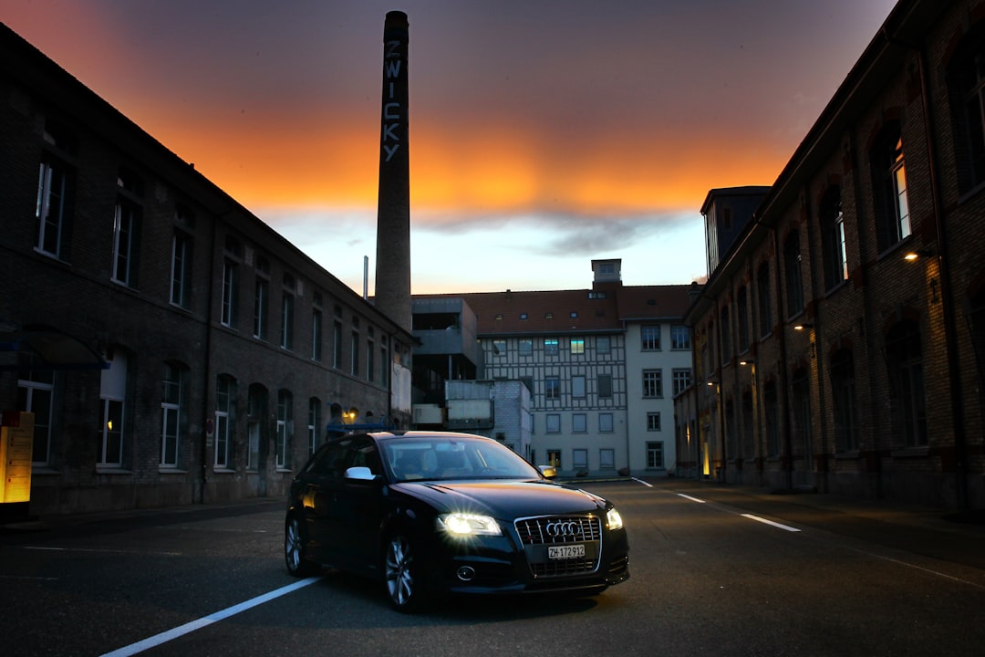 black audi a 4 on road during sunset